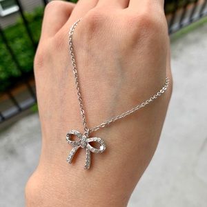 Swarovski Jewelry - Authentic Swarovski Crystal Bow Necklace Swarovski Jewelry - Authentic Swarovski Crystal Bow Necklace